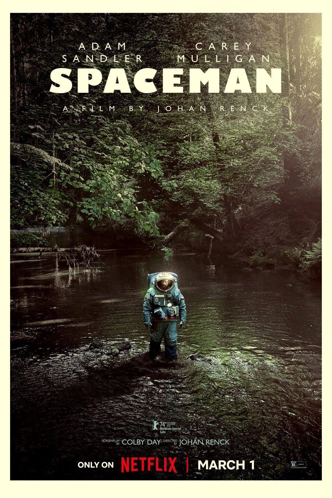 spaceman-poster-showing-adam-sandler-walking-through-a-forest-in-an-astronaut-suit